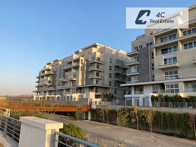 Under market price apartment with garden 140 m for sale ready to move very prime location view landscape in Mountain View i-city New Cairo