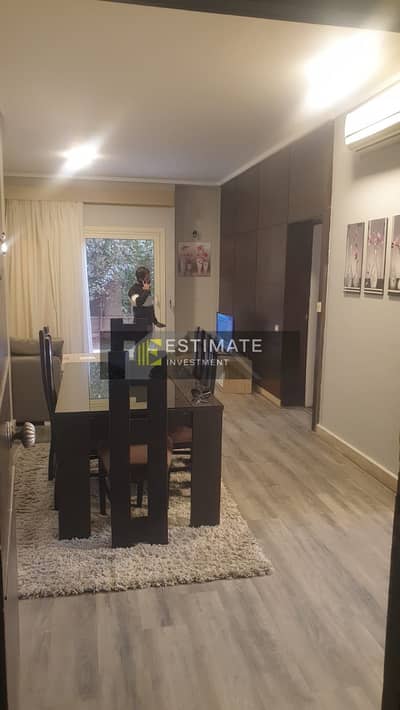 Semi-furnished studio with a garden for sale in The Village