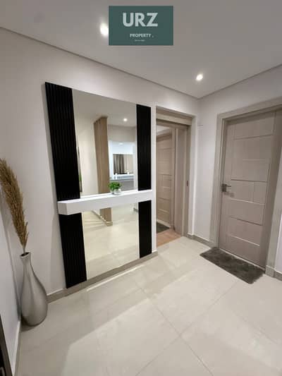 2 Bedroom apartment with a stunning double view 12-year installments or huge discount, on Suez Road minutes from AUC near Madinaty The Spine Tower 2 Bedroom apartment with a stunning double view 12-year installments or huge discount, on Suez Road minutes from AUC near Madinaty The Spine Tower