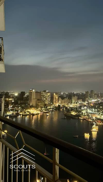 **Furnished Apartment for Sale** Living or Investment in Maadi, with a Direct Nile & Gold Island View,High Rental Returns,Just Minutes from Hilton.