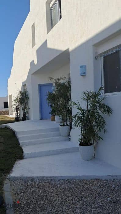 Chalet 164m with a villa design, finished, and closest delivery at a price of ????? in Givira Ras Al-Hekma