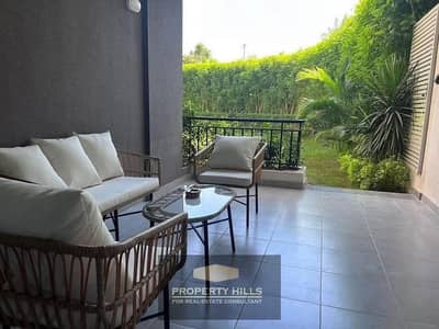 Apartment with garden, a finished rare find, ready for delivery soon in Sheikh Zayed, near Emaar and the Dahshur link