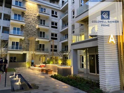 for sale a ready to move Ground floor apartment 140m² + garden 36m² with a double view inside Mountain View iCity - New Cairo - 2 bedrooms