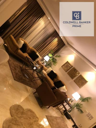 A prime opportunity for sale – an 87 sq m fully finished and furnished apartment in The Village – Palm Hills New Cairo – Fifth Settlement –​​New Cairo