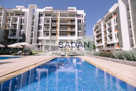 Apartment with a private garden, 15% discount and installments available in The Icon Compound, in the heart of New Cairo, behind Hyde Park Compound, n