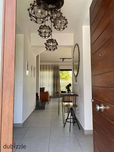 Luxury townhouse for sale, fully finished, in a prime location within the Sodic East compound in New Heliopolis.