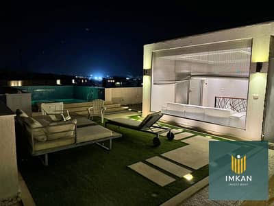 Duplex apartment with a roof, 4 bedrooms + living room, prime location, for sale in installments over 10 years in Hyde Park, New Cairo.