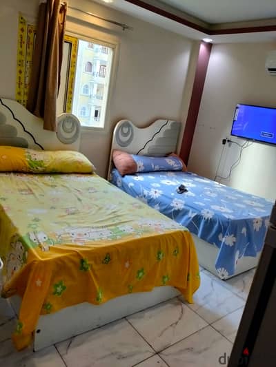 Furnished studio for rent, 6 October, Second District, behind the central axis, neighborhood 2, steps away from the bus stop and Al-Hasri