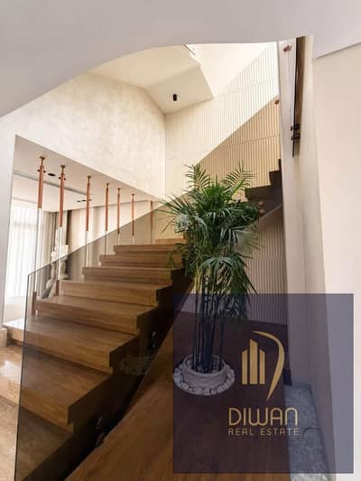 Twin house villa for sale—fully finished with A/C  and ready to move . Located directly opposite Cairo International Airport in the Taj City compound,
