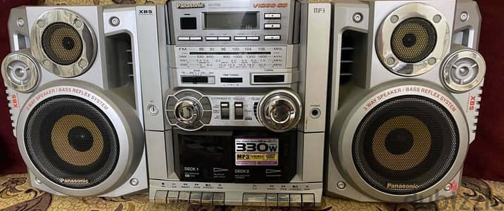player cassette with CD player on. top and radio