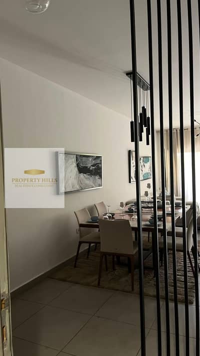 Apartment for sale two rooms fully finished in al-Bourouj compound in Al-Shorouk with a view of green spaces