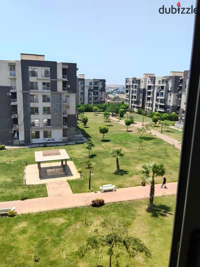 For sale, an apartment of 130 meters, ground floor, completely landscape view, in Dar Misr compound, neighborhood 16, Sheikh Zayed.