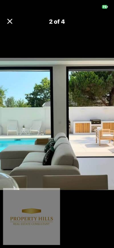 The latest finished villa in the heart of the Golden Square compound (1,450,000) overlooking the landscape of villas only next to the American University and Cairo Festival City