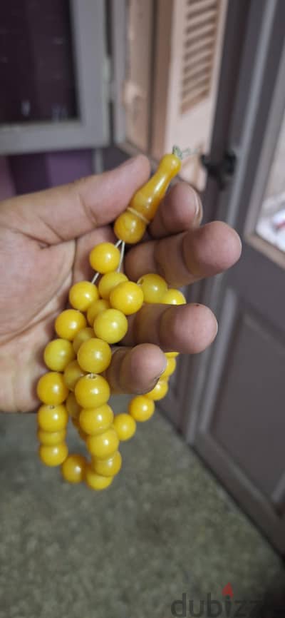 سبحة عاج و سبحة كهرمان