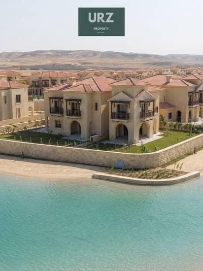 افخم فيلا تاون هاوس 5 غرف corner فيو علي lake بخصم 50 % او تقسيط علي طريق السويس للبيع بالقرب من الرحاب و the spine ومانتن فيو وكريك تاون و ذا مارك