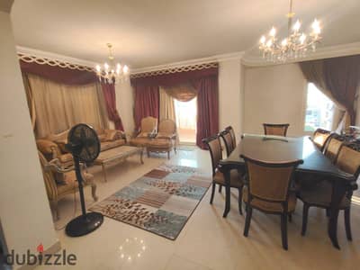 Apartment for rent in the seventh district in Sheikh Zayed with kitchen, air conditioning, and furniture, 3 bedrooms, 2 bathrooms, kitchen, and large reception on the second floor