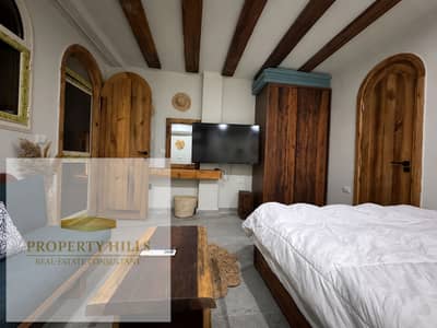 A fantastic two-bedroom apartment, fully finished with a kitchen, air conditioning, and wardrobes, in Hacienda Ras El Hekma.