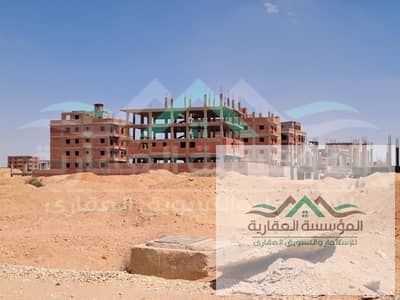 Land for sale in the best location of New October, north of Al Waha, Al Badia neighborhood, second district Land for sale in the best location of New October, north of Al Waha, Al Badia neighborhood, second district
