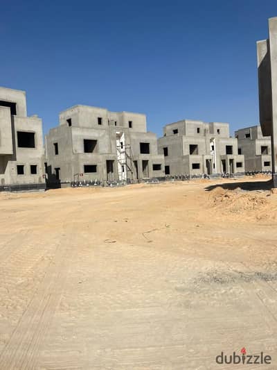 “For sale: distinctive middle townhouse in Naia West Compound, New Zayed, with 2027 delivery, a down payment of EGP 6,487,500, and flexible installmen
