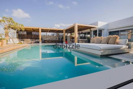 Receive a villa in Mountain View at Ras Al Hikma directly by the sea at a bargain price
