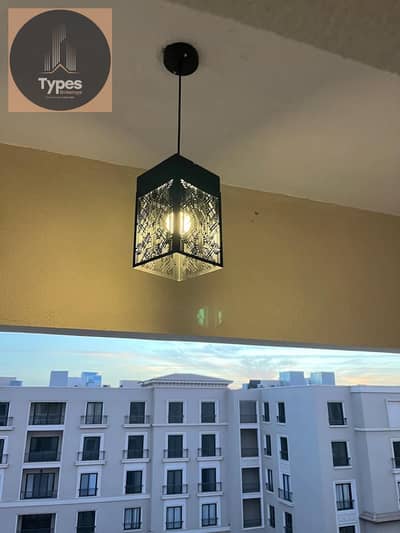 Studio apartment for sale in Village West Compound, 75 square meters, one bedroom, bathroom, American-style kitchen, reception area, sea view, fourth