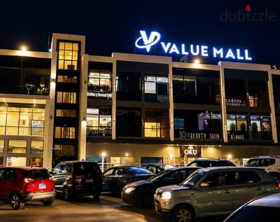 Own your shop at an attractive price, immediate occupancy, inside VALUE Mall in the heart of New Cairo | 90th Street - Shop for sale - Mivida