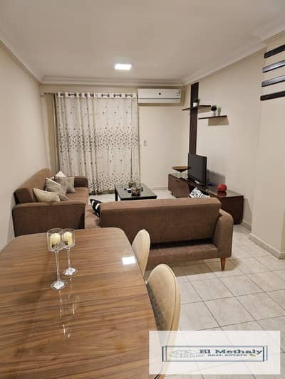 A distinctive furnished apartment for rent in Al Rehab City, New Cairo.