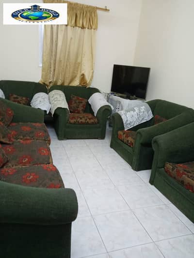 Furnished apartment for rent in Maadi from Ahmed Zaki in a popular area with all services, consisting of two rooms, a hall, a bathroom, and a kitchen, third floor, stairs in the building.