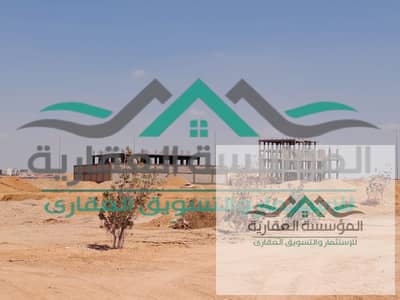 Land for sale in New October, Badia neighborhoods, north of Al-Waha, lottery 2018, distinctive, the second district