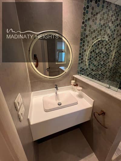 *Apartment for sale cash in Madinaty in the first phases - B2* Area / 211 meters Prime location next to services  Group 21 Allocation police Model 400 Sale includes kitchen Repeated second floor wide garden view Super Lux finishing consisting of 3 bedrooms including master and 3 bathrooms  Required cash / 12 million 650