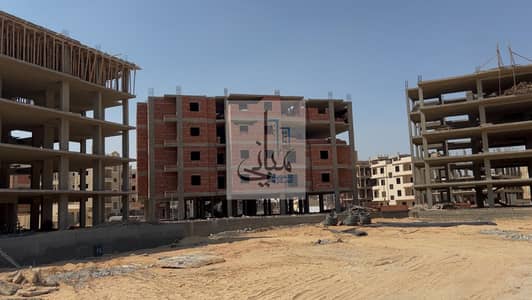 Apartment for sale via installment plan, ready for handover in one year, located on Al-Nawadi Street in the Idris Home 1 compound. The unit has an are Apartment for sale via installment plan, ready for handover in one year, located on Al-Nawadi Street in the Idris Home 1 compound. The unit has an are