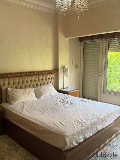 For rent: furnished apartment in Al-Mustaqbal, Sheikh Zayed, with a private garden.