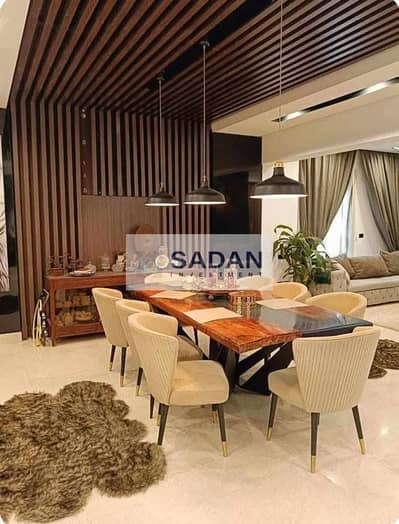 Apartment with garden for sale in Taj City Compound, New Cairo. Apartment with garden for sale in Taj City Compound, New Cairo.