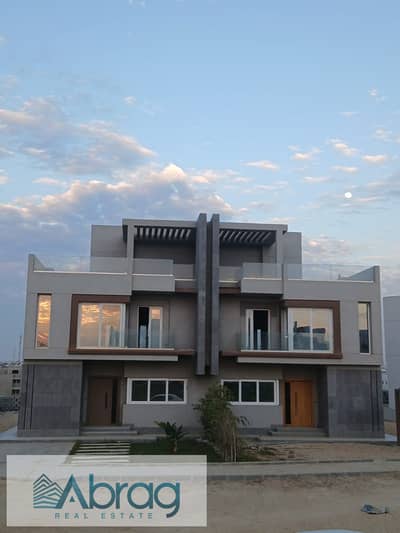 Twin house for sale, 398 sqm, ready for immediate delivery, installment plan available. Located in V Levels Compound, Sheikh Zayed, on Dahshur Link Ro
