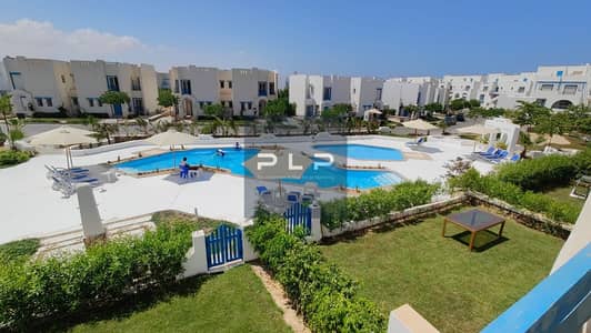 Fully furnished chalet for sale in Mountain View Ras El Hekma—north-facing with a swimming pool view, ready to move, and offered at an