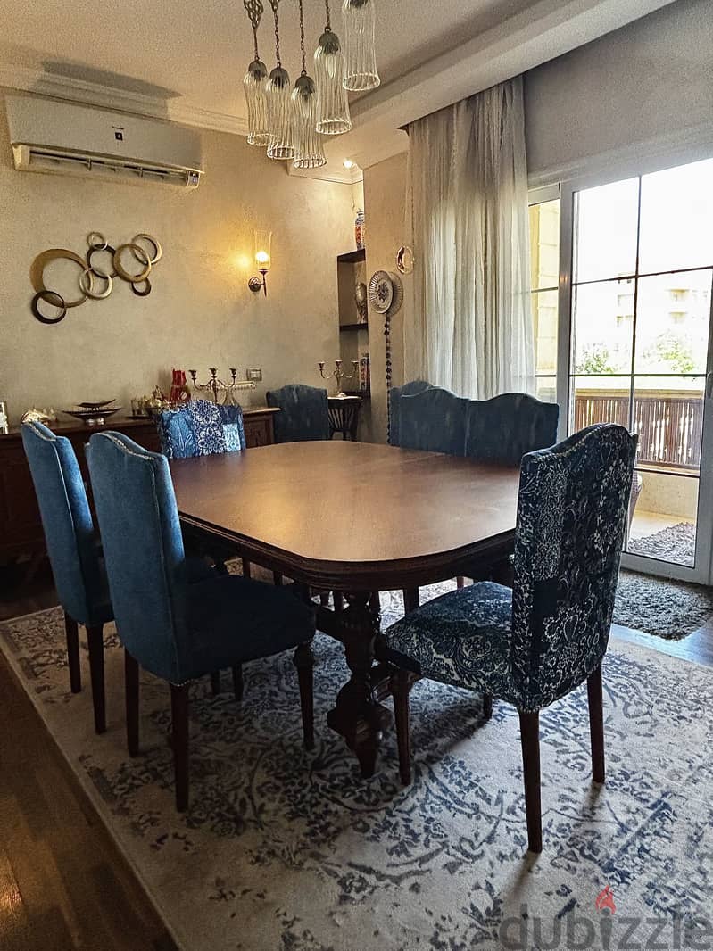 Dining table + 10 chairs 1