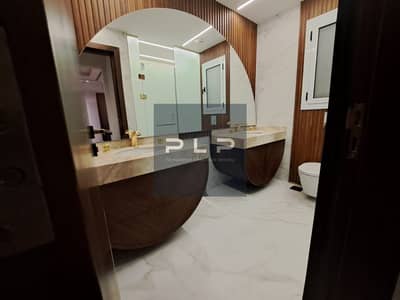 Super-lux finished apartment, ready to move-in, at a bargain price in the Mivida Emaar compound, Fifth Settlement.