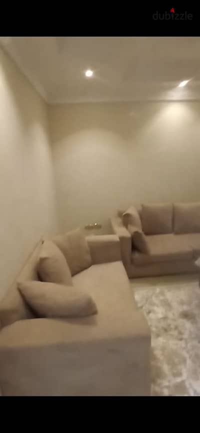 Furnished apartment for rent, two bedrooms and a bathroom, second floor in Bavaria, Al Sharq, Zahraa Al Maadi. Minutes to Carrefour and Fifty Mall, a quarter of an hour to the Fifth Settlement, and minutes to the school complex and Wadi Degla Club. All services and transportation are nearby. 20 thousand required monthly for a year. 01503622666