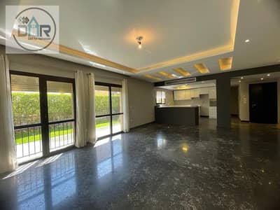 For rent in Courtyard Sodic: a ground-floor apartment with a garden—fully air-conditioned and including kitchen units!