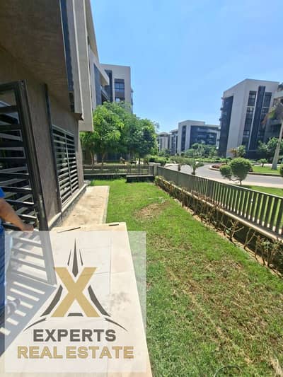Apartment for sale in Privado Madinaty, Ground 96m with a 45m garden, first occupancy, steps to services, distinguished finishing with air conditioning.