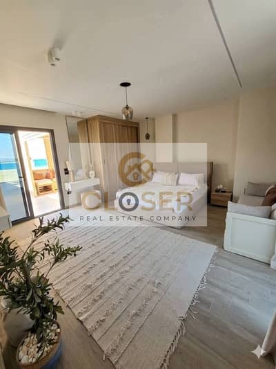Fully furnished hotel chalet with sea view for sale in Ras El Hekma, with installments over 10 years.
