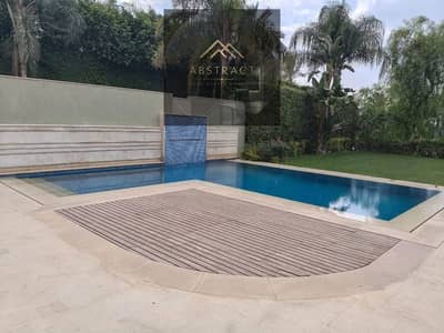 Townhome villa with garden and private roof fully finished for sale + private pool in New Cairo on the Suez Road near Madinaty and Sodic.