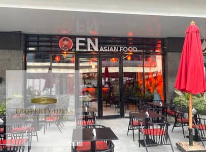 Shop for sale, currently rented for 140,000 to a restaurant. Immediate occupancy. The entire mall is operational. Located in Fifth Settlement, Clubs Street.