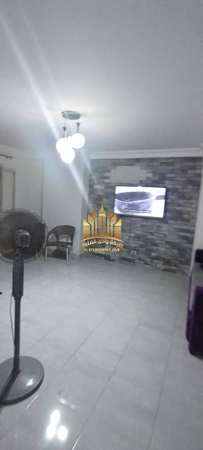 Apartment for sale in Baron City Compound, area 90 m, two rooms and a reception, bathroom and kitchen, first floor after the ground, super lux finishing, side facade overlooking the garden, the building entrance from inside the compound, final price 2 million 550 for quick sale, cash only