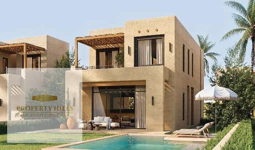 Independent villa for sale near the sea, fully finished with air conditioning, a fantastic panoramic view with a 30% discount, and the rest in installments in Ras Al Hikma, North Coast, near Naya Bay