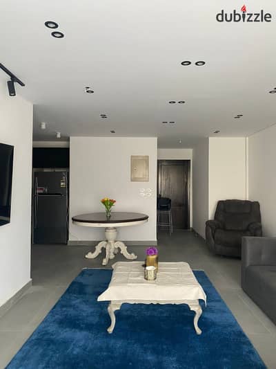 Apartment for sale 124 sqm with garden 50 sqm garden view super lux finishes near services transport and The Spine in Madinaty B6