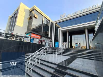 Commercial shop for rent, ground floor, area 26 meters, super deluxe finishing, "Value Mall Al Shorouk"