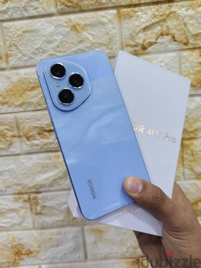 Honor 400 Pro 512 giga نسخه 16 ram فتحه علبه