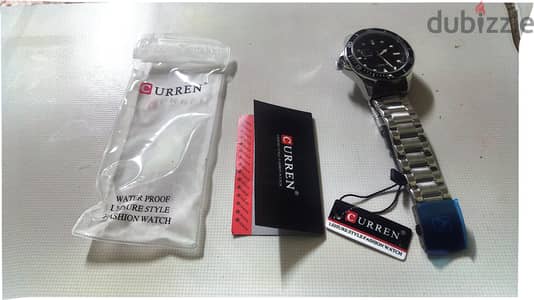 ساعة curren