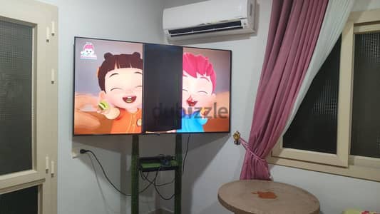 شاشة مكسورة - هاير 65 بوصة  تقطيع